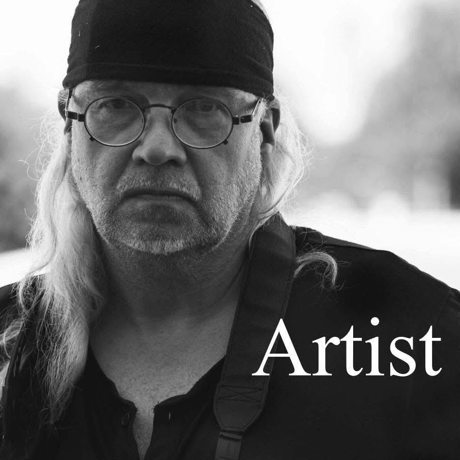 Martcel Albion exhibition booth with sculptures and paintings